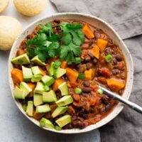 square image of chili, grey background