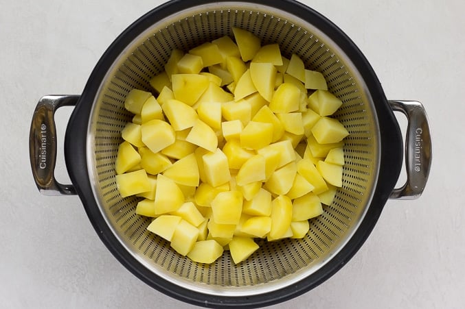 potatoes straining for vegan potato salad