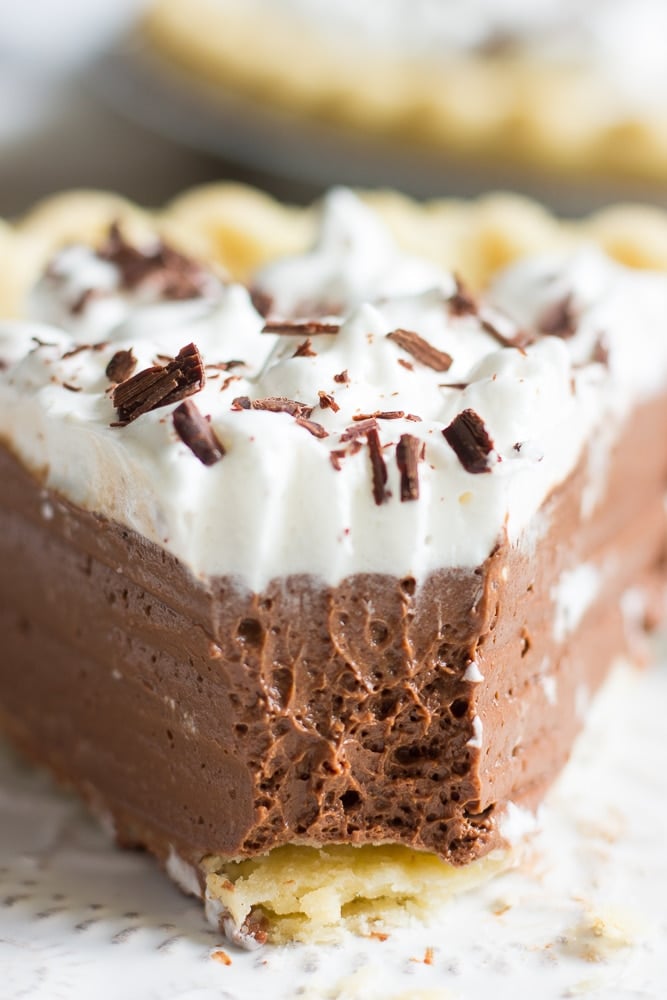 close up of vegan chocolate pie with bite taken from a piece.