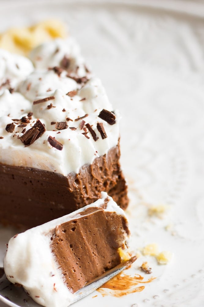 piece of vegan chocolate pie with a bite on a fork