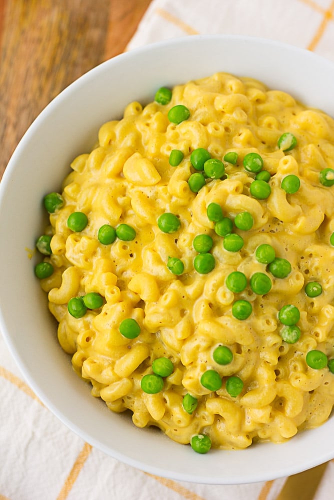 large bowl of vegan mac and peas