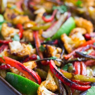 vegetarian fajitas in pan, close up from side.