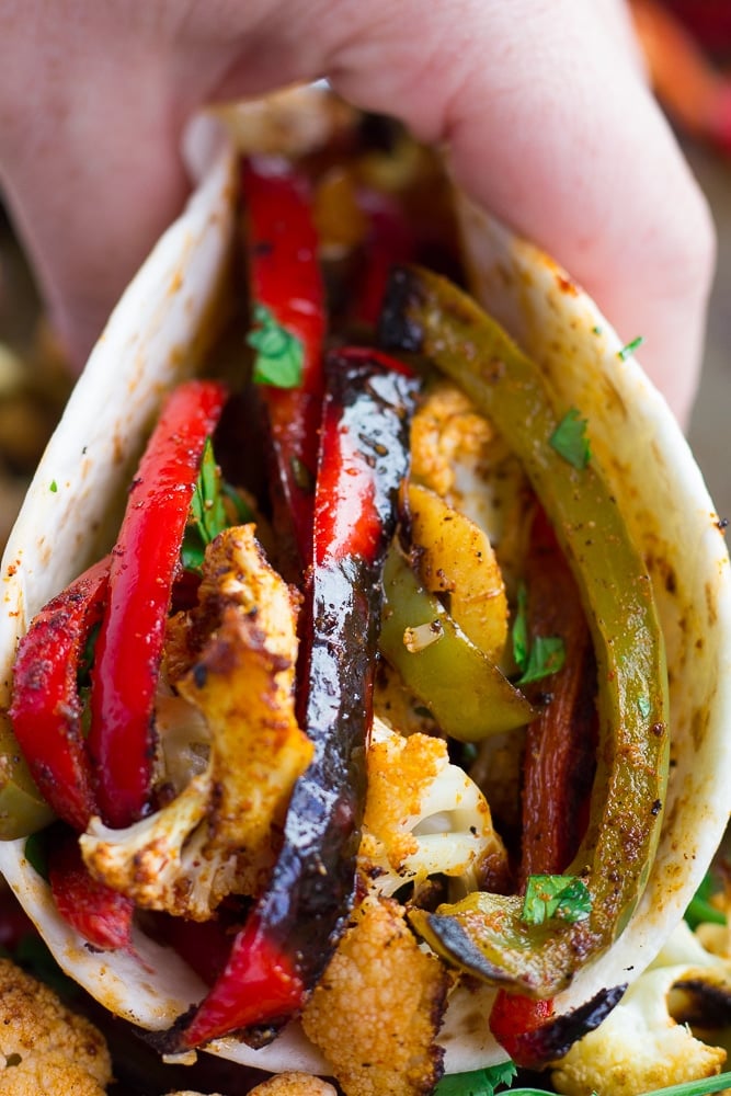 tortilla filled with vegetarian fajitas close up.