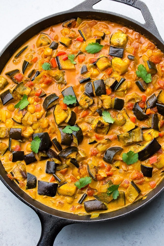 mixed eggplant curry in a cast iron pan