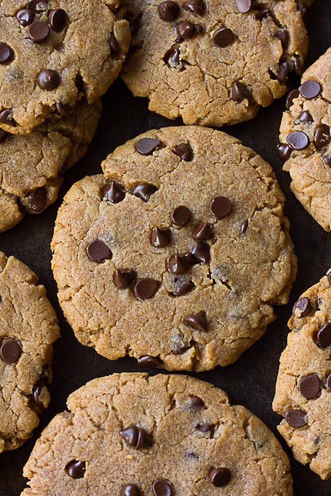 Oil Free Peanut Butter Chocolate Chip Cookies on pan crowded together.