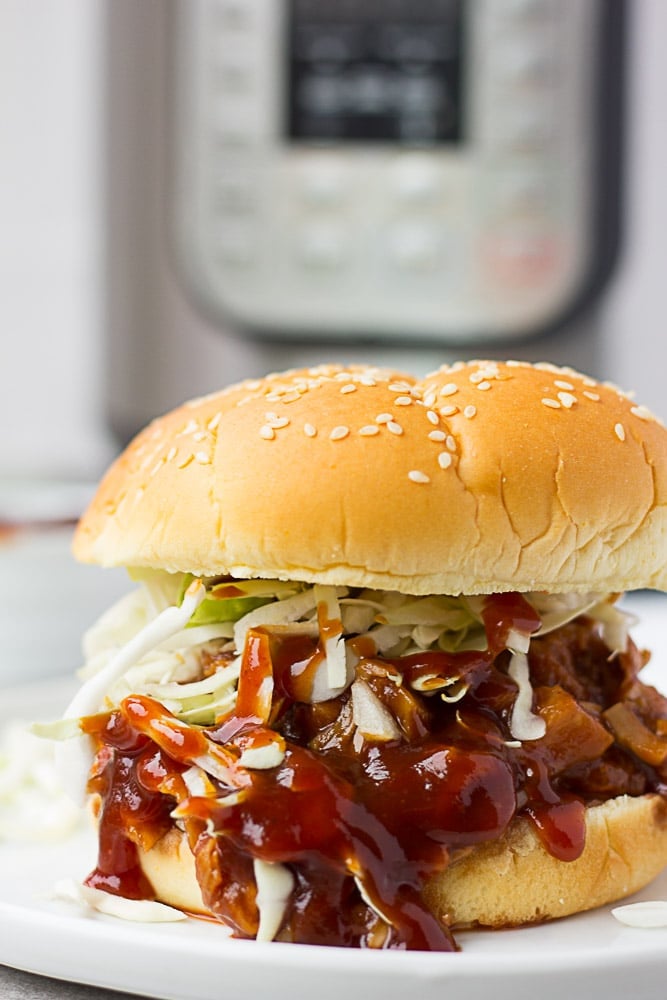 Instant Pot Pulled BBQ Jackfruit sandwich with coleslaw on top
