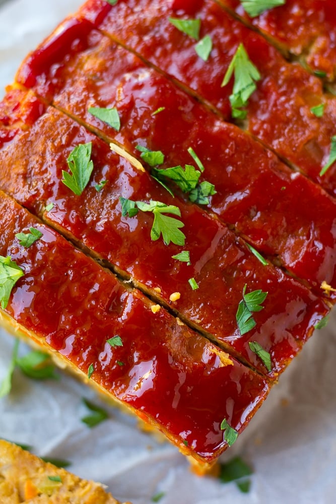 close up of ketchup topping on top of the vegan meatloaf