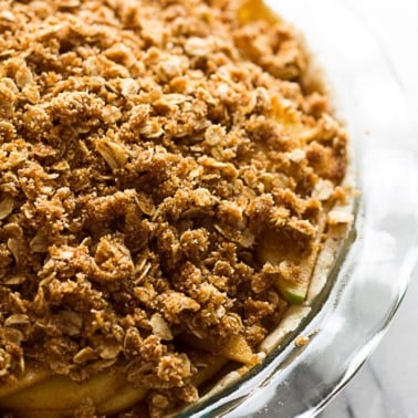 Gluten Free Vegan Apple Crumble Pie: Made with an almond flour crust, minimal oil, and full of sticky sweet apples with a perfect crumble topping.