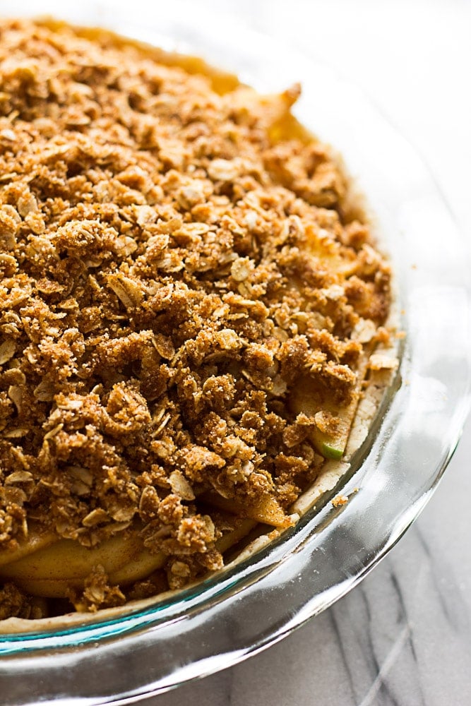 Gluten Free Vegan Apple Crumble Pie: Made with an almond flour crust, minimal oil, and full of sticky sweet apples with a perfect crumble topping.