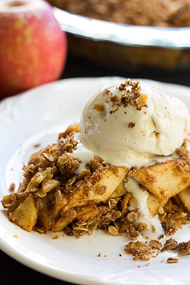 Gluten Free Vegan Apple Crumble Pie: Made with an almond flour crust, minimal oil, and full of sticky sweet apples with a perfect crumble topping.