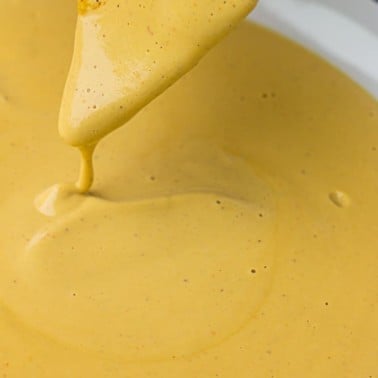 Easy Vegan Nacho Cheese Sauce: Made with cashews, this vegan nacho cheese sauce is a cinch to make, healthy and kid-friendly!