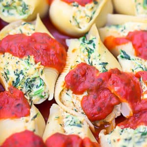 square image of stuffed shells in dish