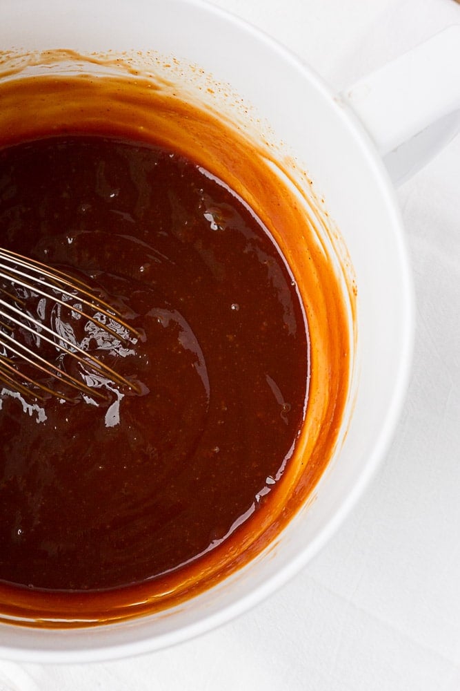 Top down shot of vegan barbecue sauce in a bowl.