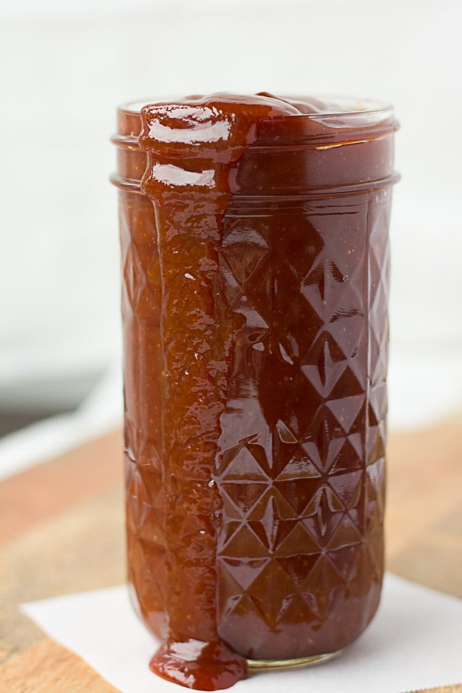 Quick and Easy Vegan Barbecue Sauce in a mason jar from the side.