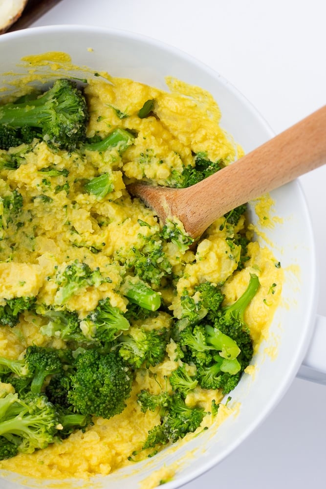 mix of cheesy potatoes with broccoli in a bowl