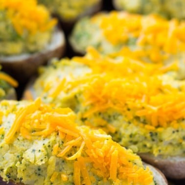 close up of several vegan cheesy twice baked potatoes