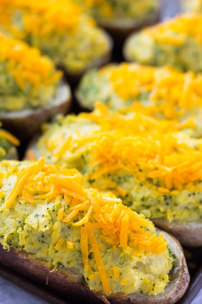 close up of several vegan cheesy twice baked potatoes