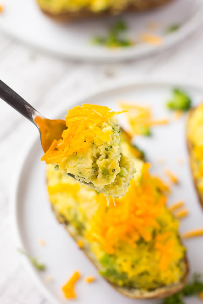 a bit on a fork of vegan cheesy broccoli twice baked potatoes
