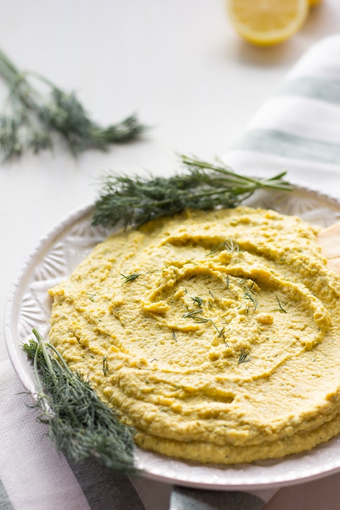 lemon dill hummus on plate form side