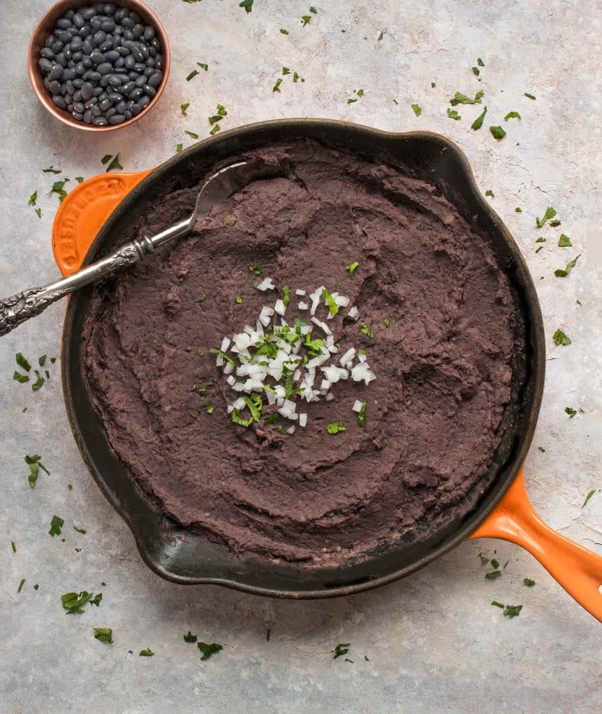 black refried beans in a bowl