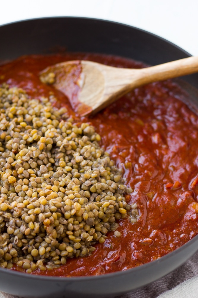 lentils being added to pan for vegan sloppy joes