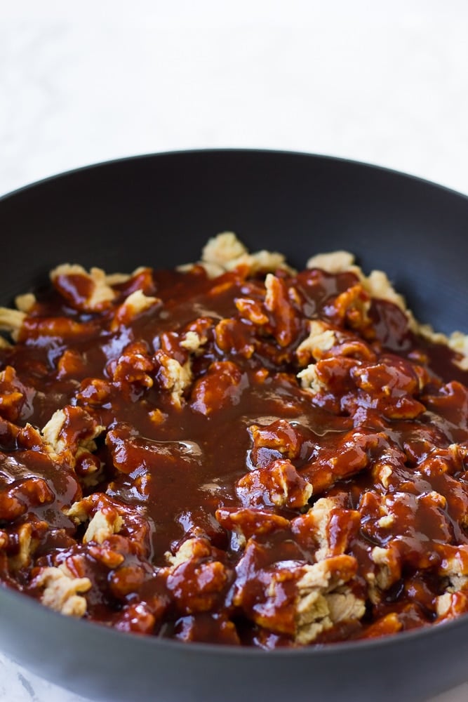 soy curls with bbq sauce on top in pan