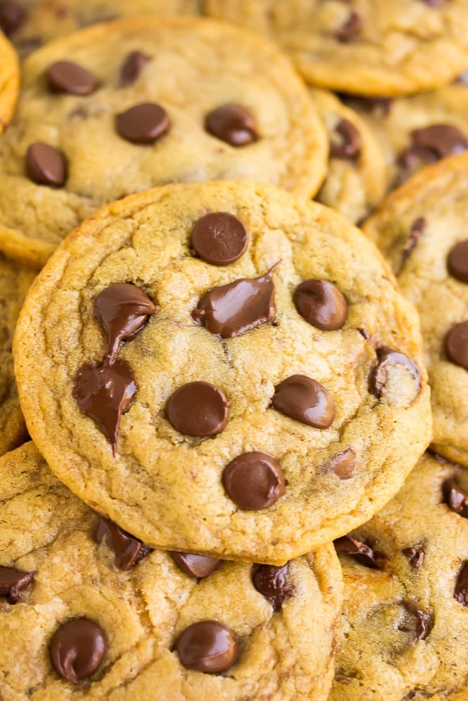 up close shot of vegan chocolate chip cookies, on top of each other.