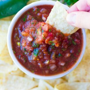 chip dipping into restaurant style salsa recipe