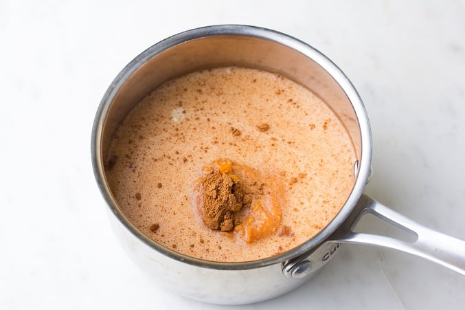 ingredients added to pot for pumpkin spice latte, before whisked smooth