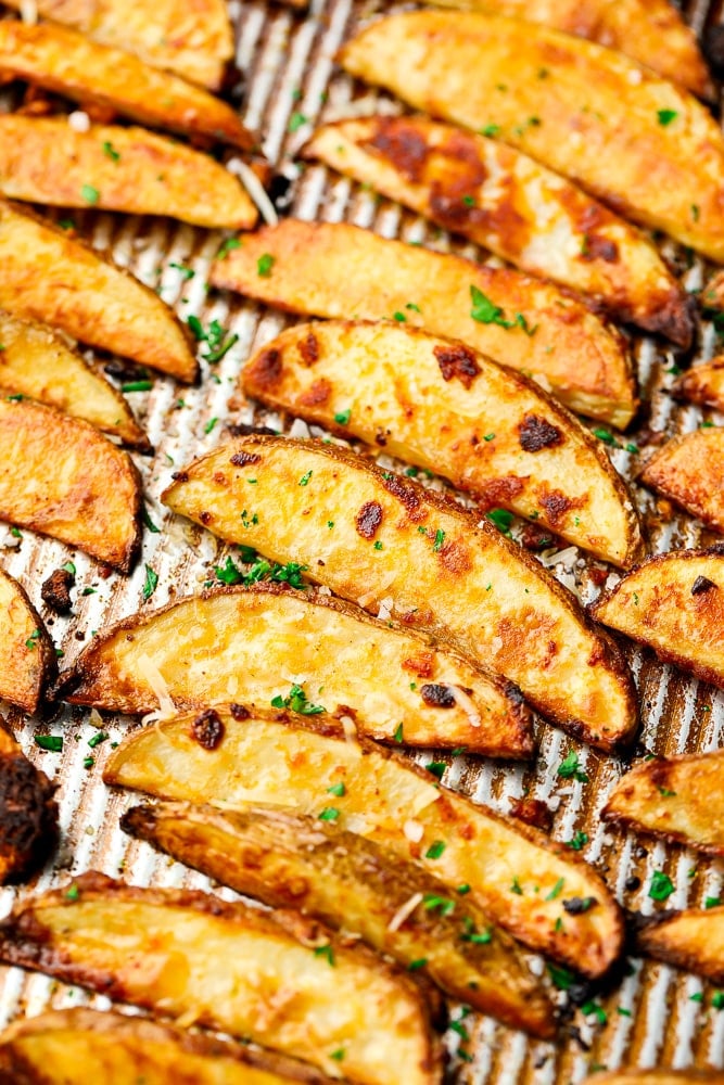 crispy potato wedges on a pan