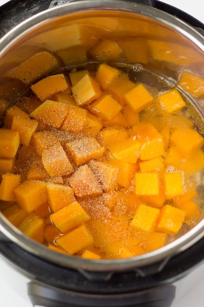 butternut squash chopped in an instant pot with water