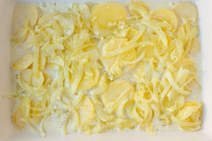 layered potatoes with onions and garlic