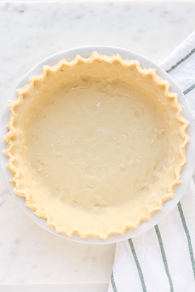 finished vegan pie crust with fluted edges, not cooked