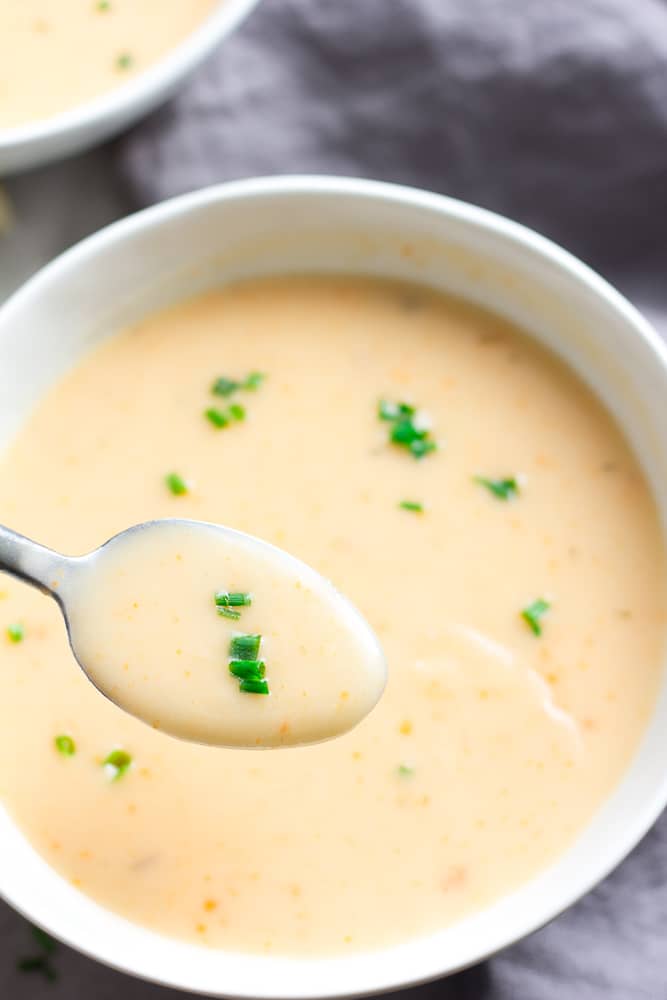 bowl of vegan potato soup with a spoon