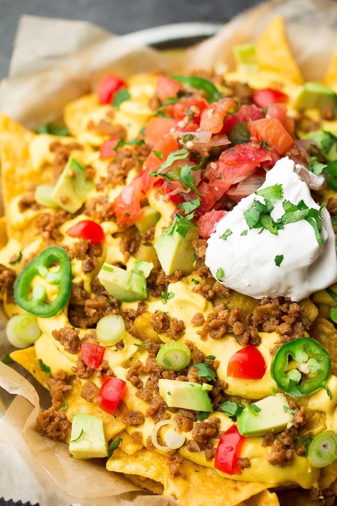 close up of nachos on a plate