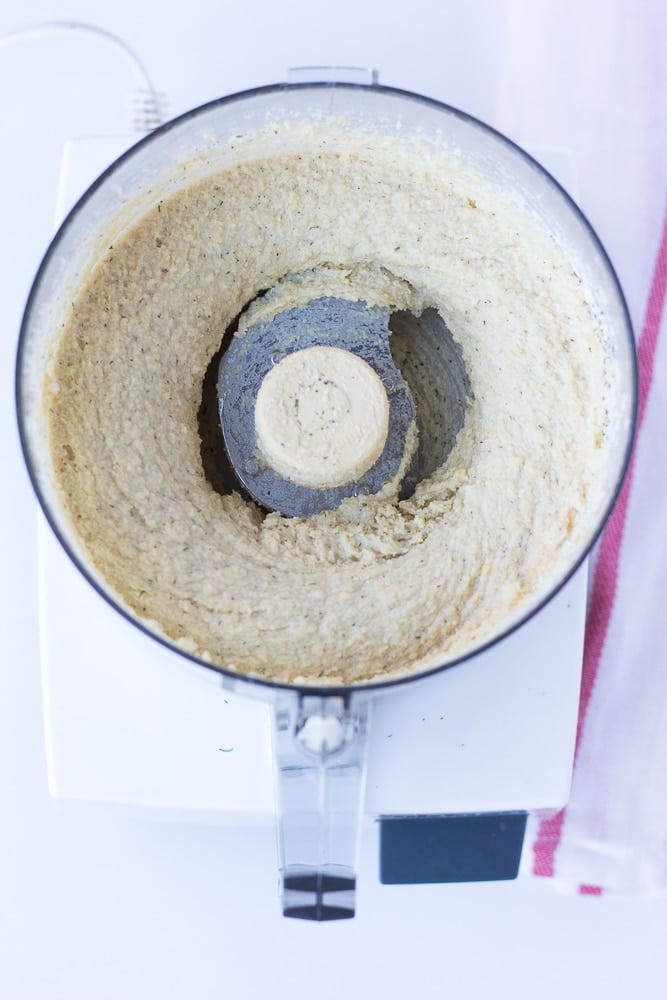 vegan cheese ball being made in the food processor