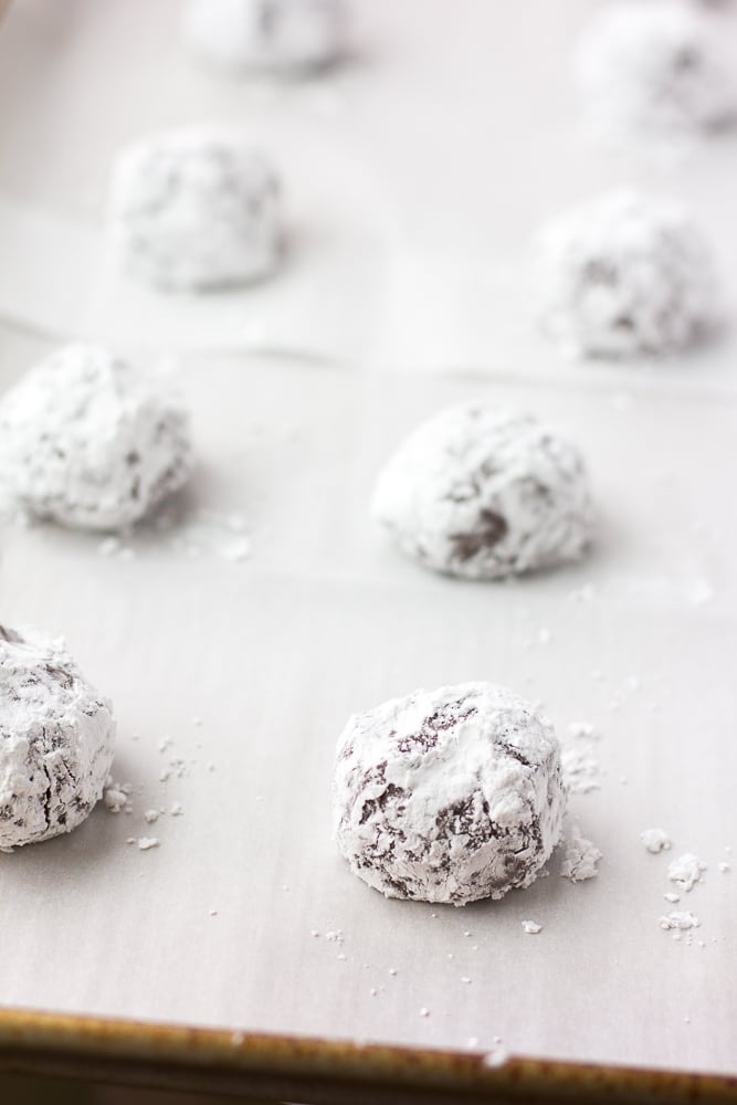 vegan chocolate crinkle cookies before being baked on pan