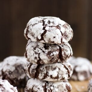vegan chocolate crinkle cookies in a stack of 4