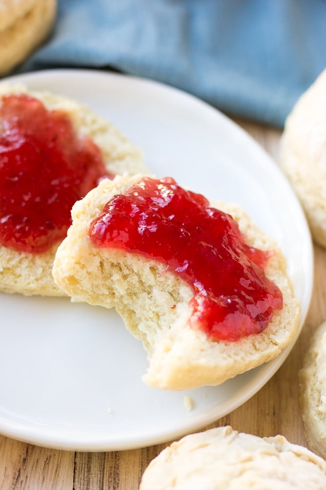 vegan biscuits with a bite taken out of one.