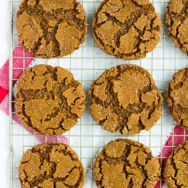 lots of vegan ginger cookies on a rack