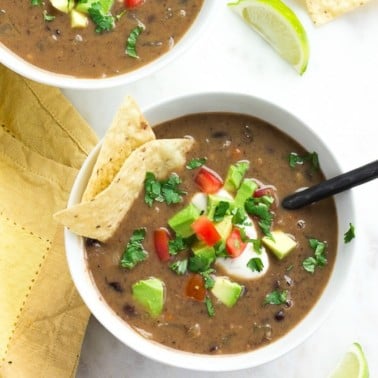 square image of two bowls of vegan black bean soup