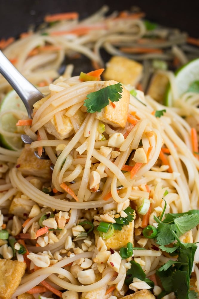 large spoon with lots of vegan pad thai on it