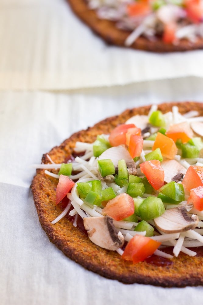 sweet potato pizza crust with toppings before being baked again.