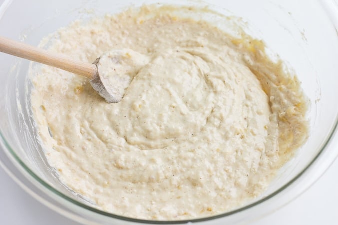 pancakes mixture being stirred in a bowl.