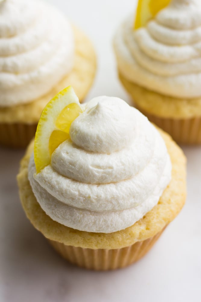 close up looking down on a vegan lemon cupcake.