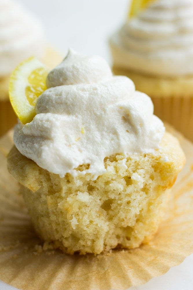 bite taken out of vegan lemon cupcake