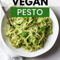 pinterest image with text over the photo of pesto made vegan