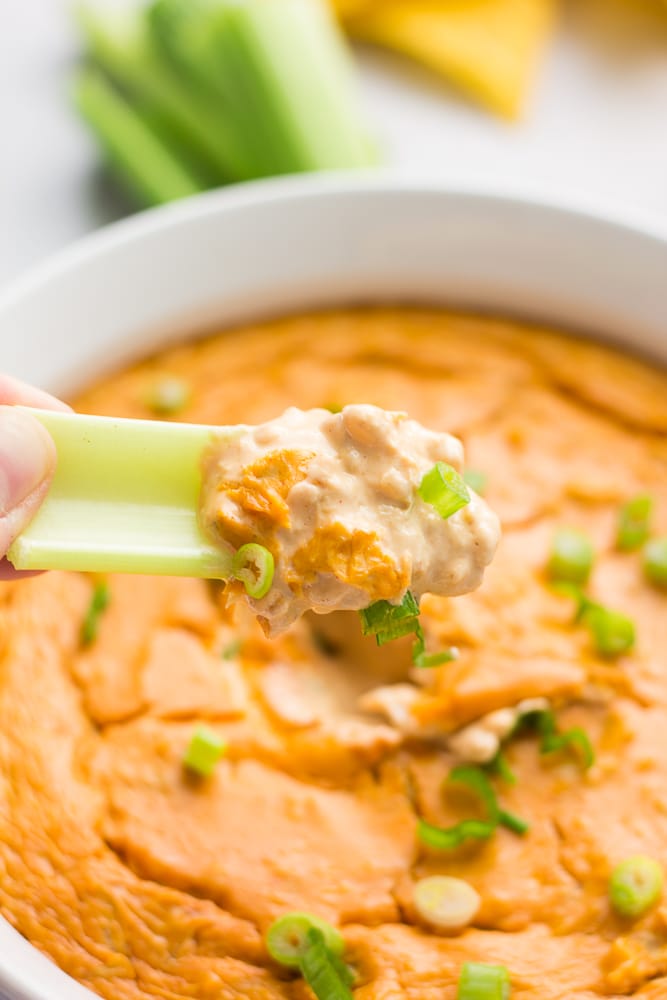 celery with buffalo dip on it