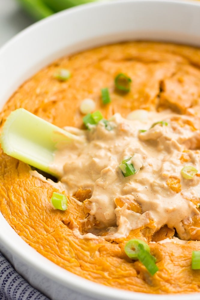 celery dipped into vegan buffalo chicken dip