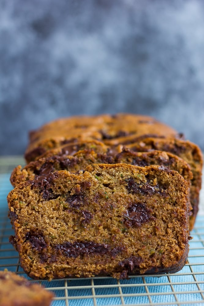 close up of vegan zucchini bread with black and white background.